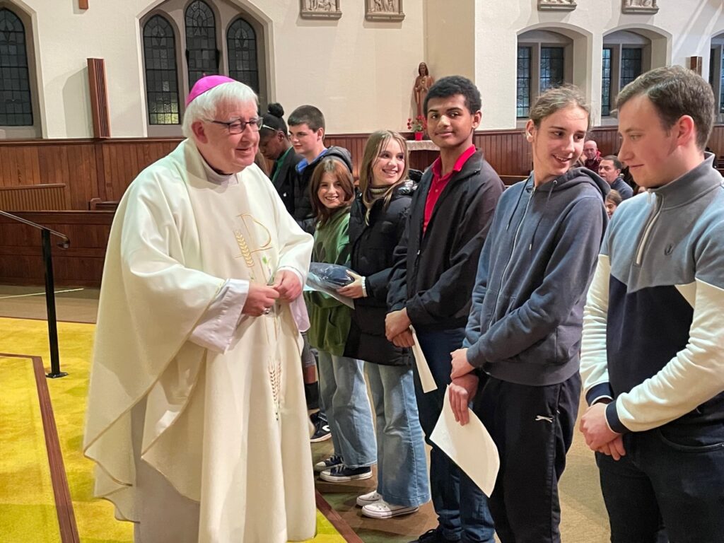 Bishop with young people
